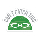 Dye cut motivational decal with 'Can't Catch This' text in gray and a green swim cap design on a white background