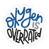 Dye cut motivational decal with 'Oxygen is Overrated' text in blue, gray  and black on a white background