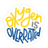 Dye cut motivational decal with 'Oxygen is Overrated' text in yellow, blue, and gray on a white background