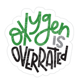 Dye cut motivational decal with text 'Oxygen is Overrated' in green, gray, and black on a white background