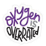 Dye cut motivational decal with 'Oxygen is Overrated' text in purple, gray  and black on a white background